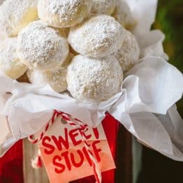 These almond snowball cookies just melt in your mouth. Perfect Christmas cookies since they look like darling little snowballs.