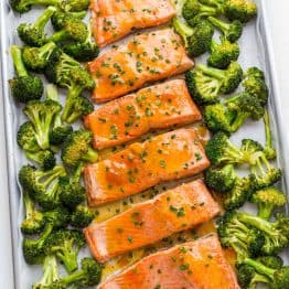 Apricot Dijon Salmon and Broccoli is an easy, excellent one-pan salmon meal. The sweet and savory apricot glaze seals in the juices of the salmon making it moist and flaky. You will enjoy every bite of this apricot glazed salmon. Learn: What is the difference between wild caught and farmed salmon