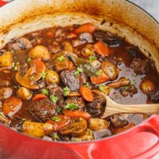 Tender beef stew simmered in a soup pot