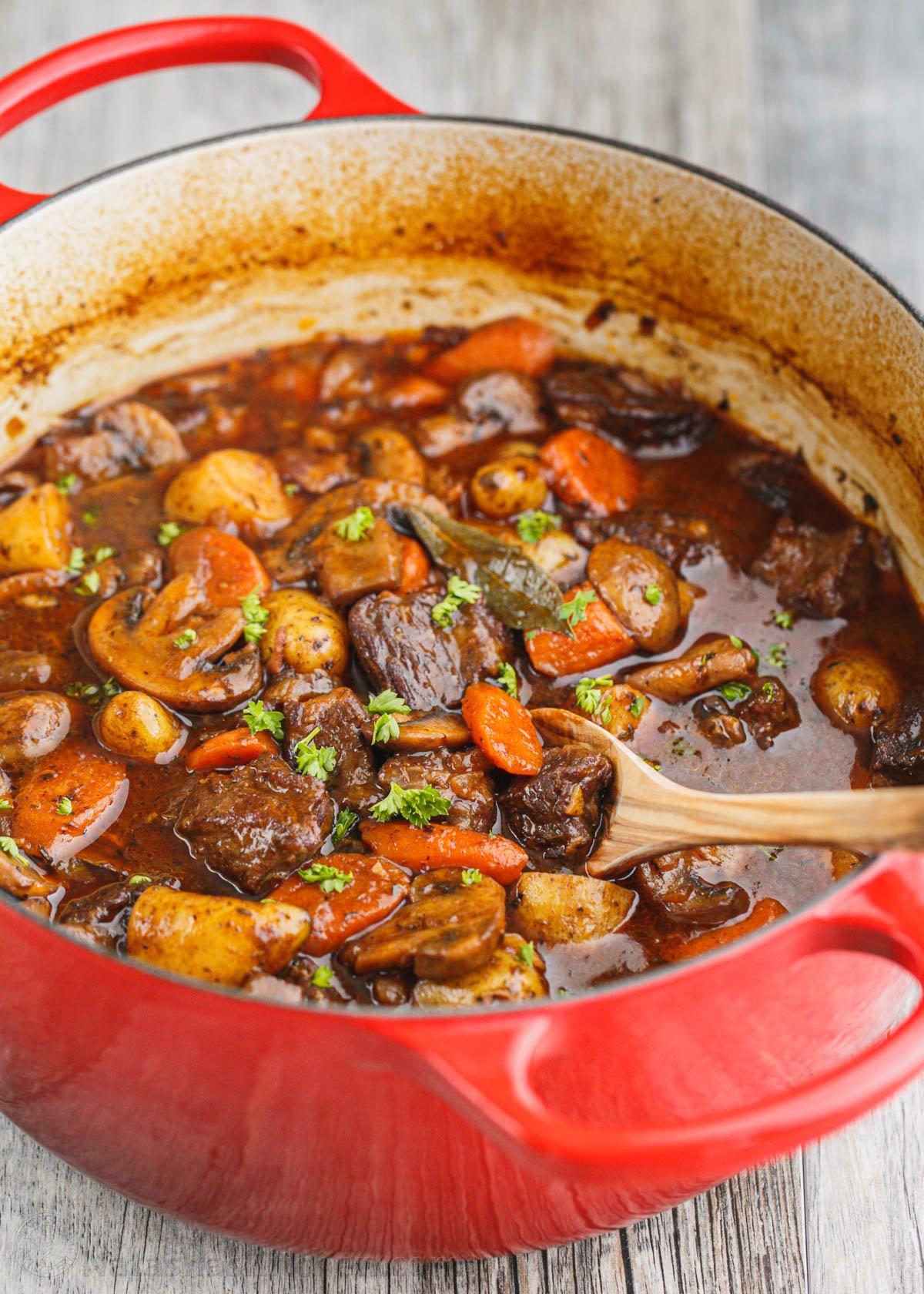 The beef in this homemade beef stew is so tender and just melts in your mouth! @natashaskitchenBeef Stew. Ok, yum! The beef is so tender and just melts in your mouth! #beefstew #beefstewrecipe #beef #beefbourguignon Tender beef stew served garnished with parlsey