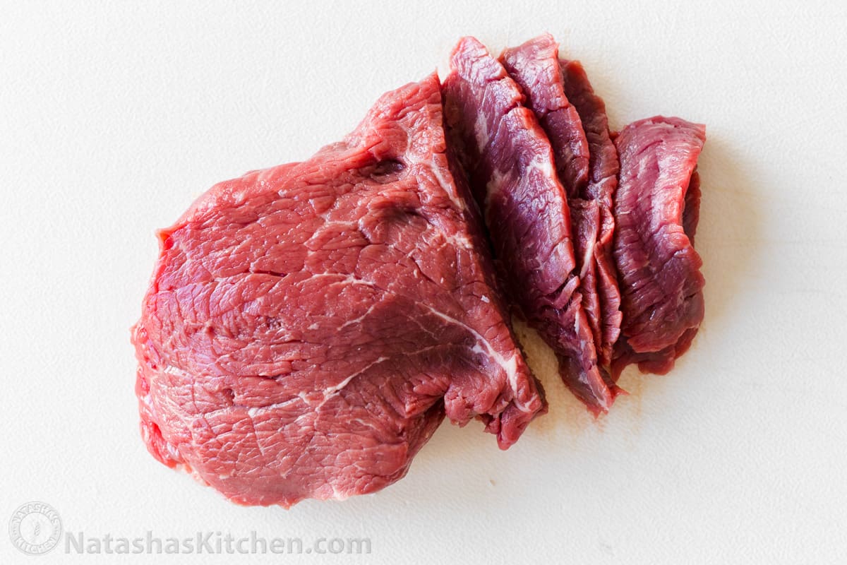 Top sirloin steak beef thinly sliced