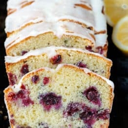 Lemon blueberry bread sliced with lemon glaze
