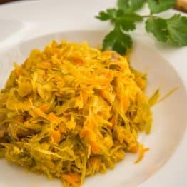 A white plate of Russian braised cabbage