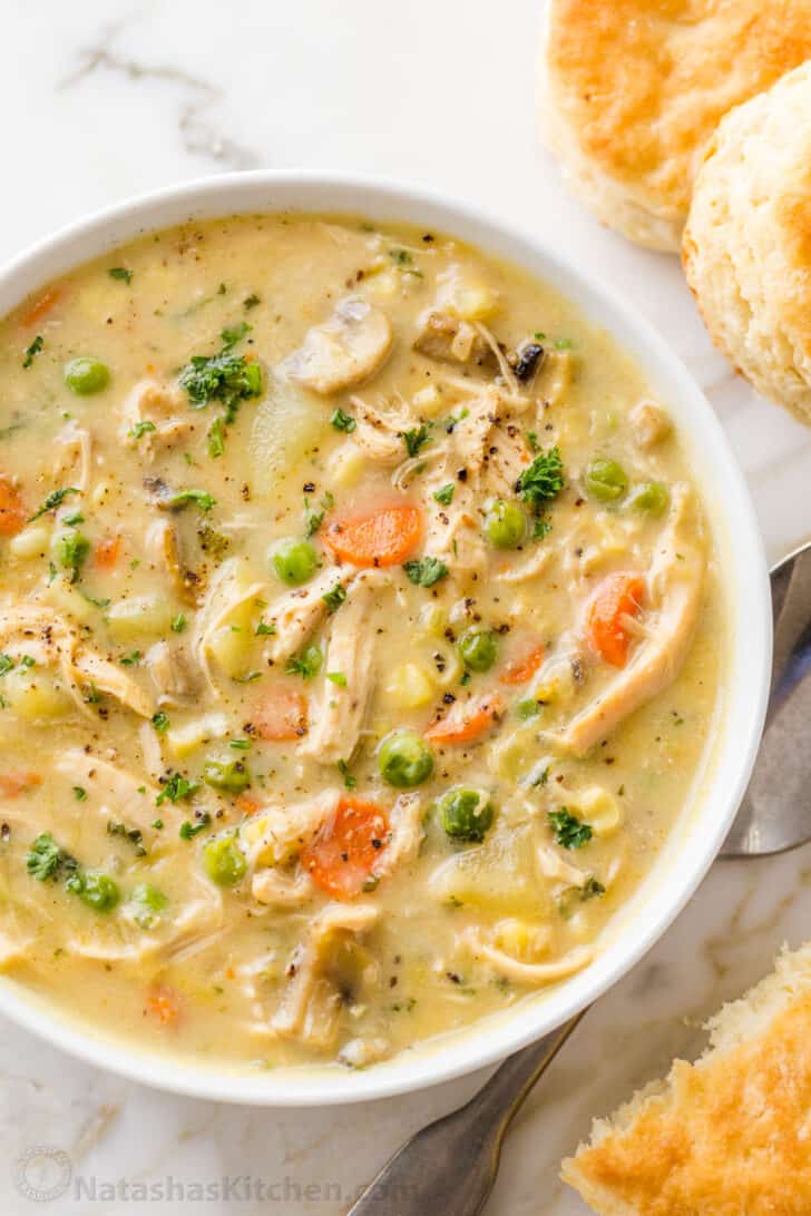 Chicken Pot Pie Soup is creamy, hearty, and delicious. This soup has all the comforts of Chicken Pot Pie without having to make a crust. chicken pot pie soup in a bowl