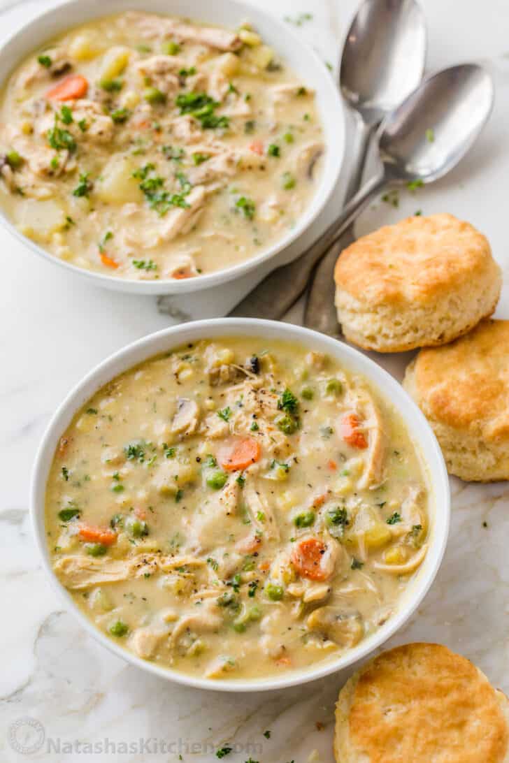 Chicken Pot Pie Soup is creamy, hearty, and delicious. This soup has all the comforts of Chicken Pot Pie without having to make a crust. Chicken Soup Served with biscuits