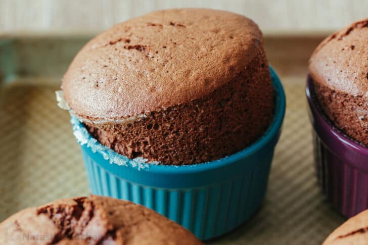 Chocolate Soufflé rises beautifully and is intensely chocolatey. Learn how to make Chocolate Soufflé with chocolate sauce and whipped cream. Souffle baked in ramekin cups