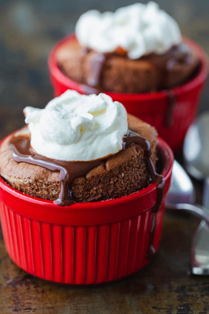Chocolate Soufflé rises beautifully and is intensely chocolatey. Learn how to make Chocolate Soufflé with chocolate sauce and whipped cream. Chocolate Souffle topped with chocolate sauce and whipped cream