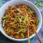 Egg Roll in a Bowl served with green onion and chopsticks