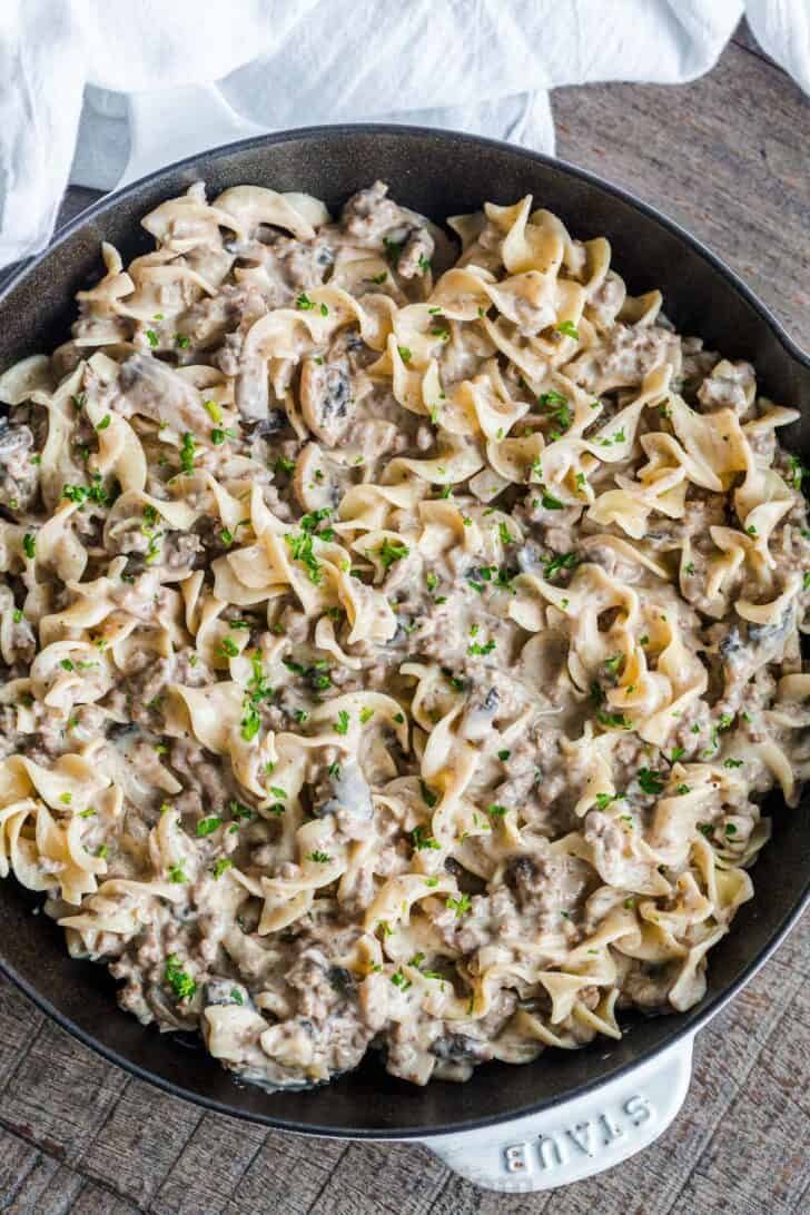 Ground Beef Stroganoff in a serving pan with pasta