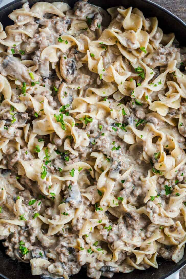 Ground Beef Stroganoff in a serving dish with pasta