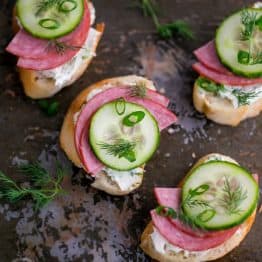 These Kielbasa and Cucumber Crostini just hit the spot. Simple and inexpensive to prepare and the recipe can easily be doubled for a hungrier crowd.