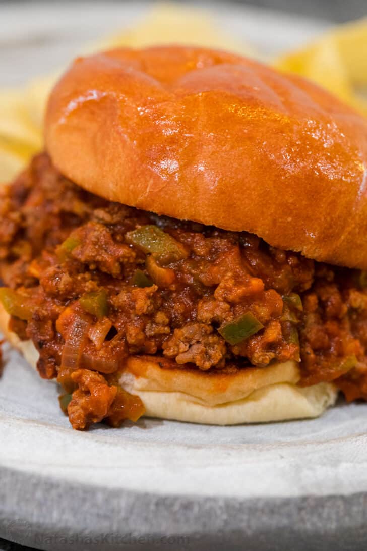 The BEST Homemade Sloppy Joe recipe with ground beef, onion, and bell pepper in tomato sauce served on toasted buns. An easy 30-minute dinner Sloppy Joes in-between toasted sandwich buns toasted to perfection.